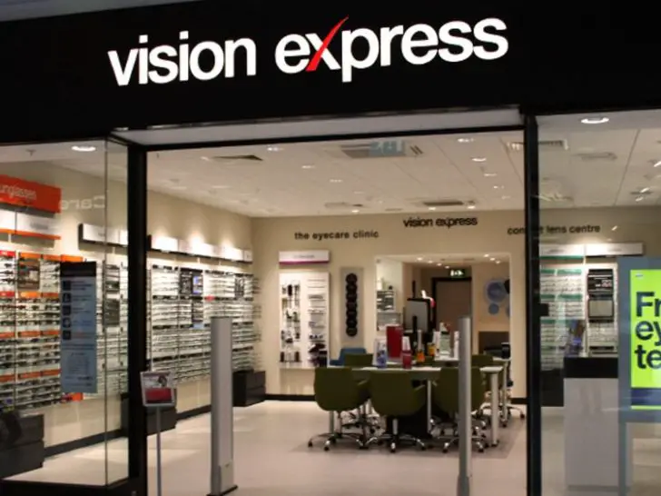 What company owns Vision Express