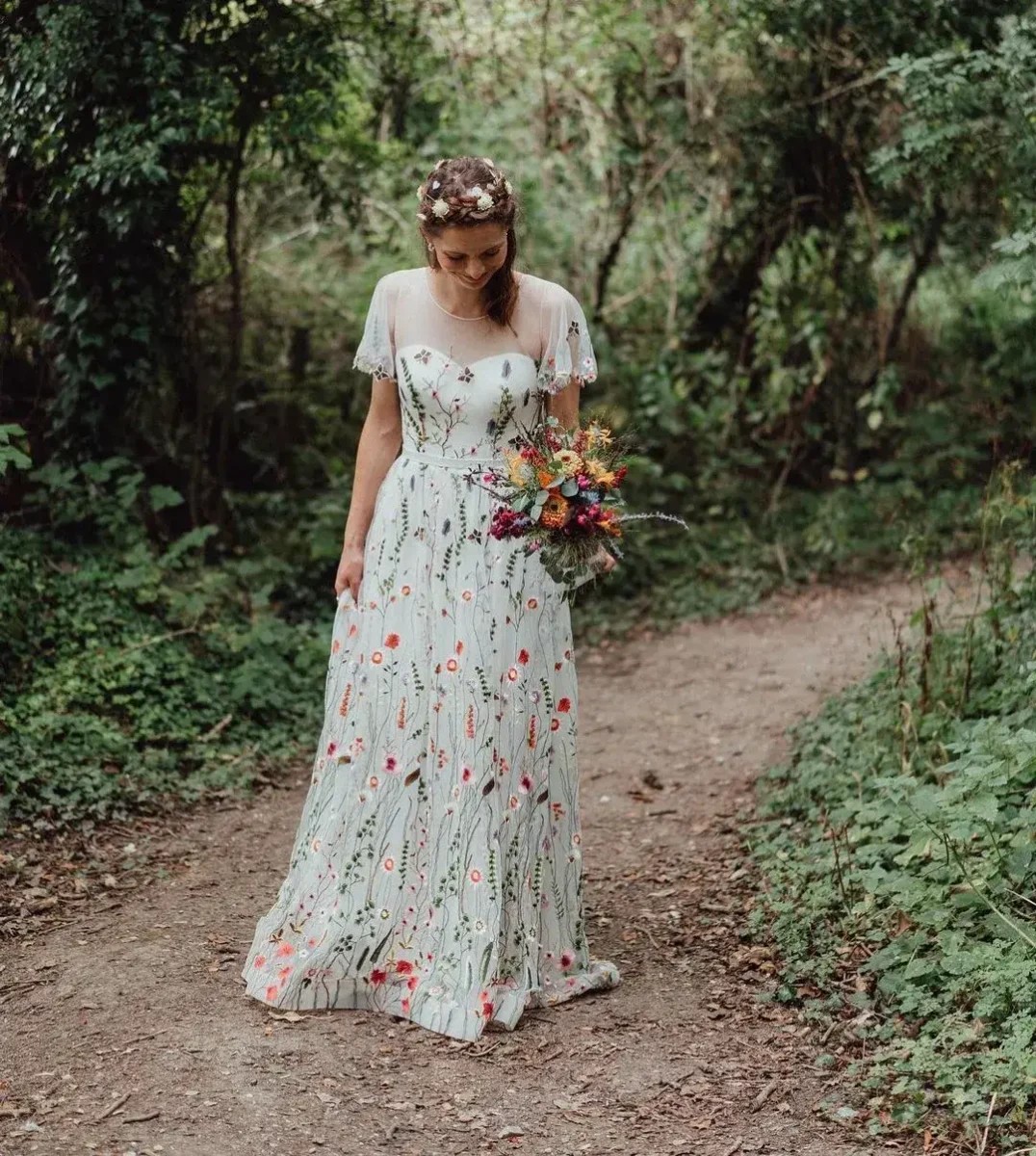 Accessorising a floral wedding dress.