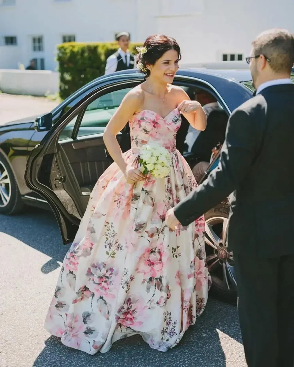 Accessorising a floral wedding dress.